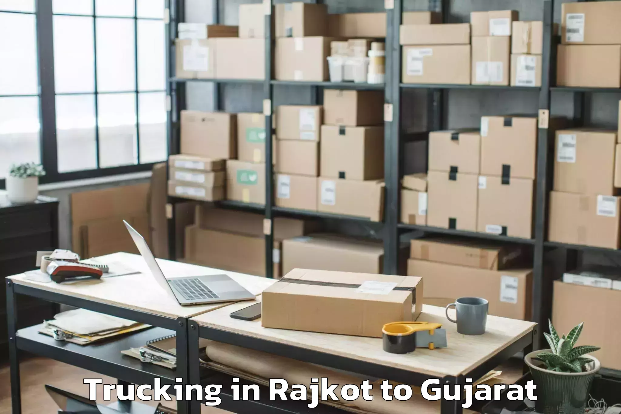 Hassle-Free Rajkot to Bhilad Trucking